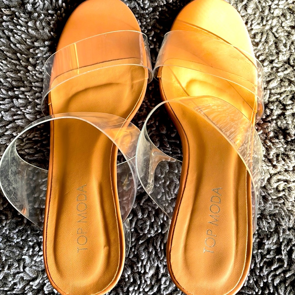 Clear Sandler. Small heel. Worn once.